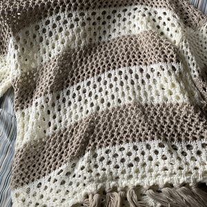 White and tan sweater